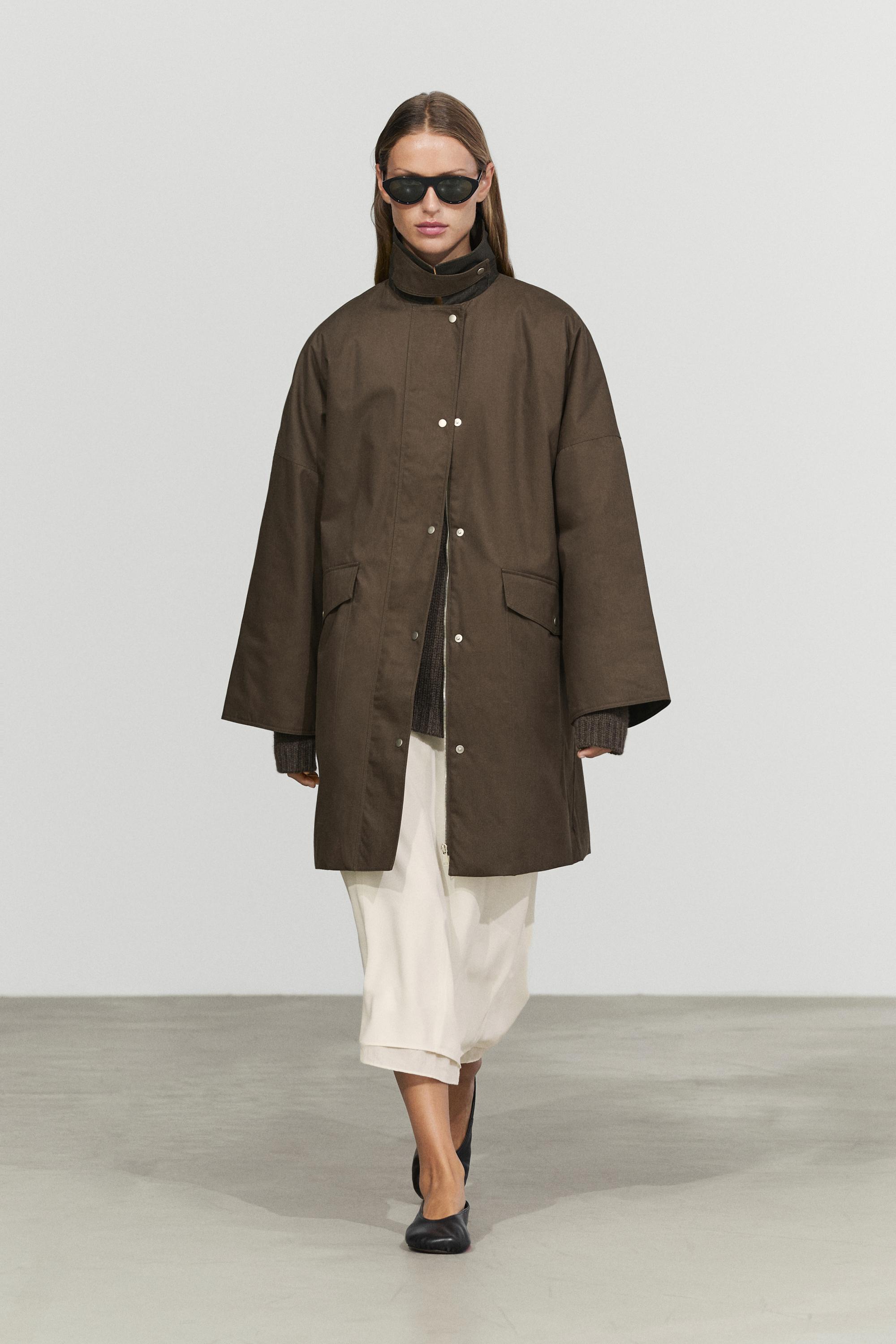 Waxed-effect parka with plaid lining